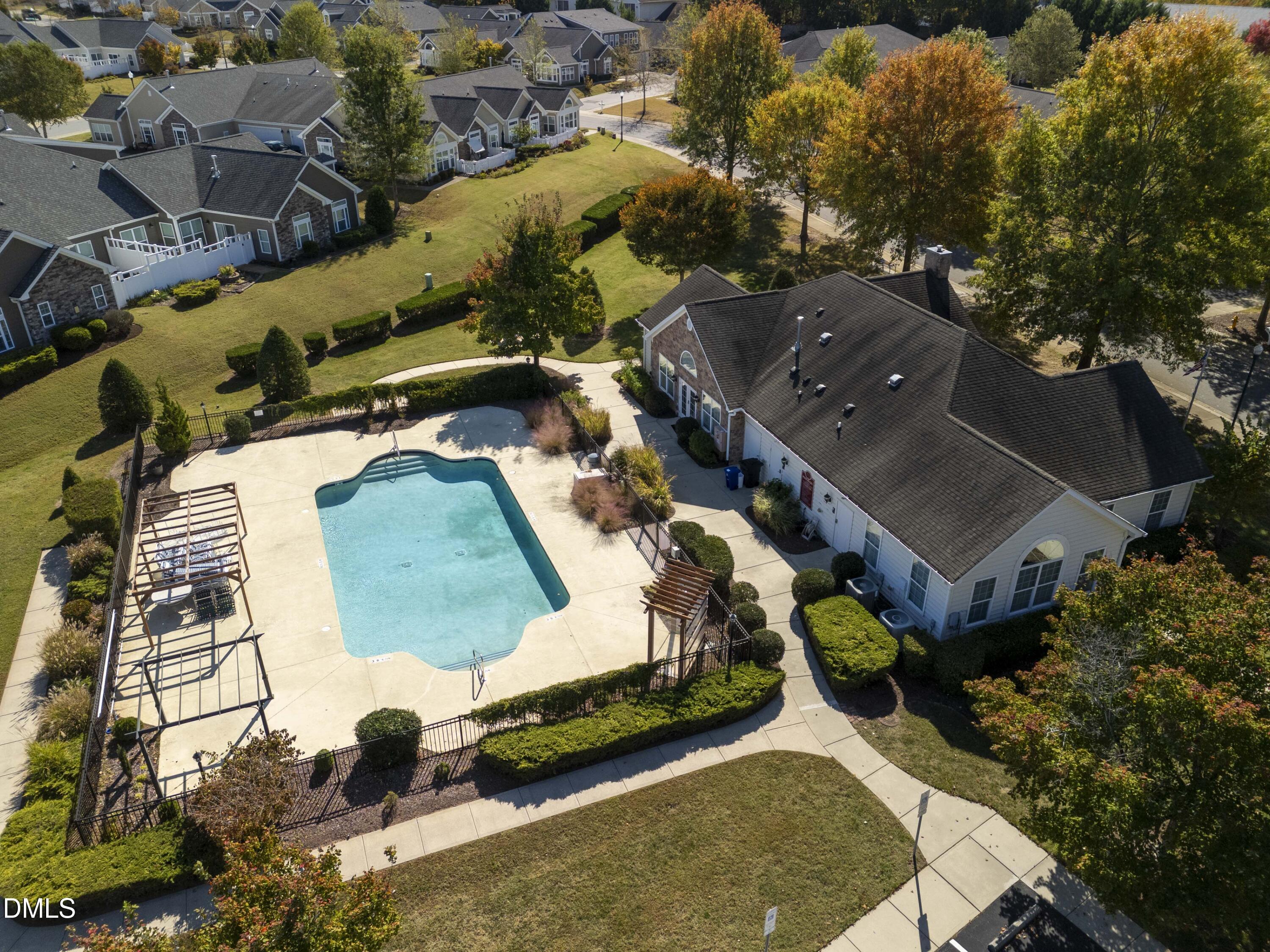 1663 Winter Wren Circle Wake Forest, NC 27587 - Photo 30 of 31 an aerial view of a house with a swimming pool and outdoor seating