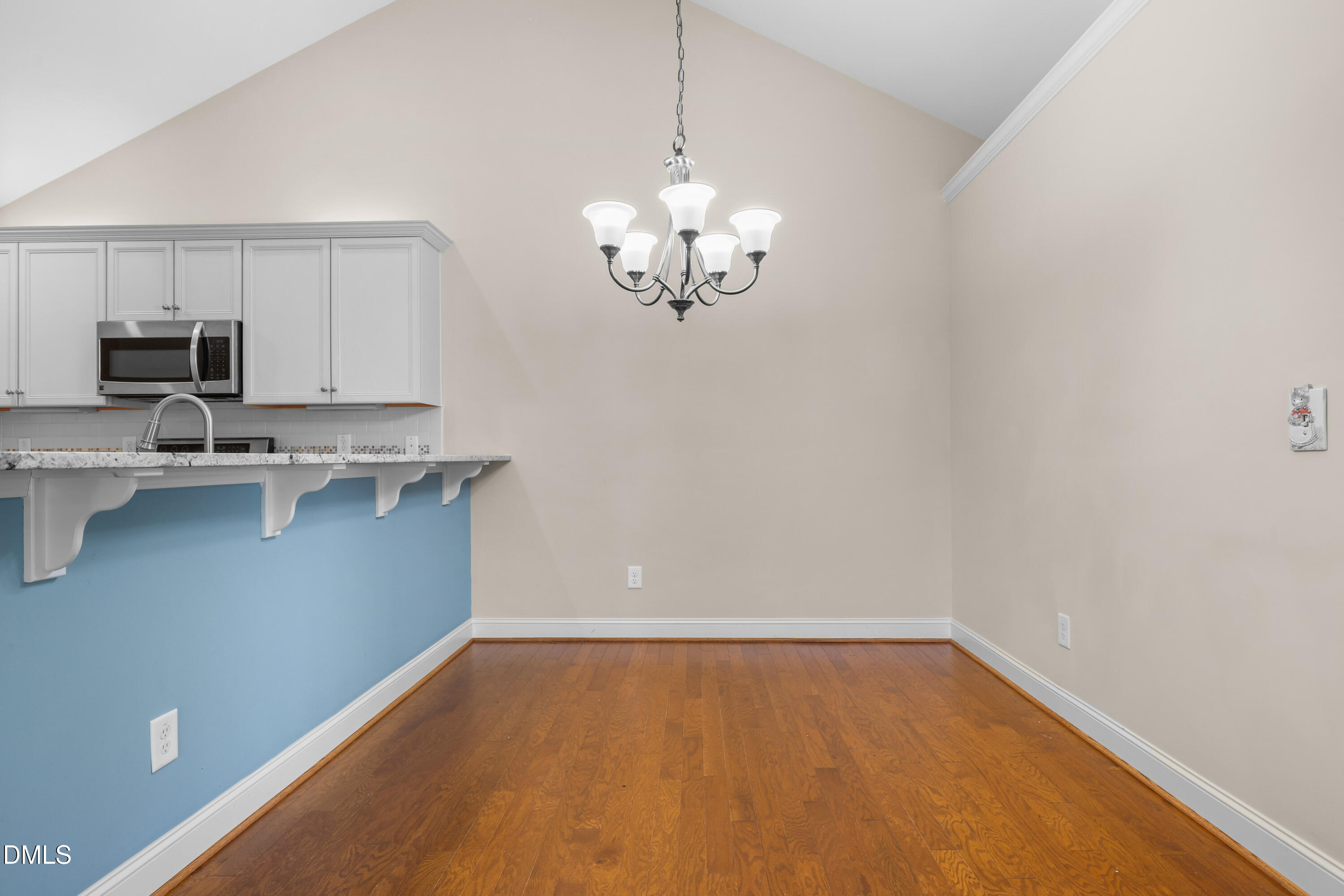 1663 Winter Wren Circle Wake Forest, NC 27587 - Photo 8 of 31 a view of a kitchen with microwave and cabinets