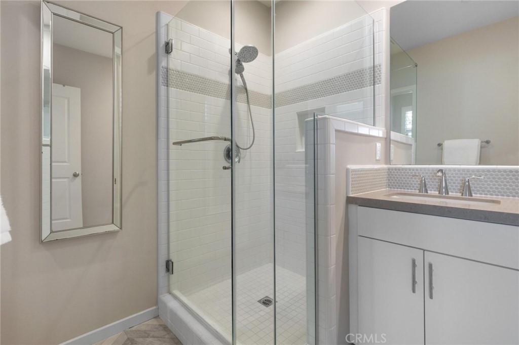125 Leafy Twig Irvine, CA 92618 - Photo 22 of 35 a bathroom with a shower and a sink