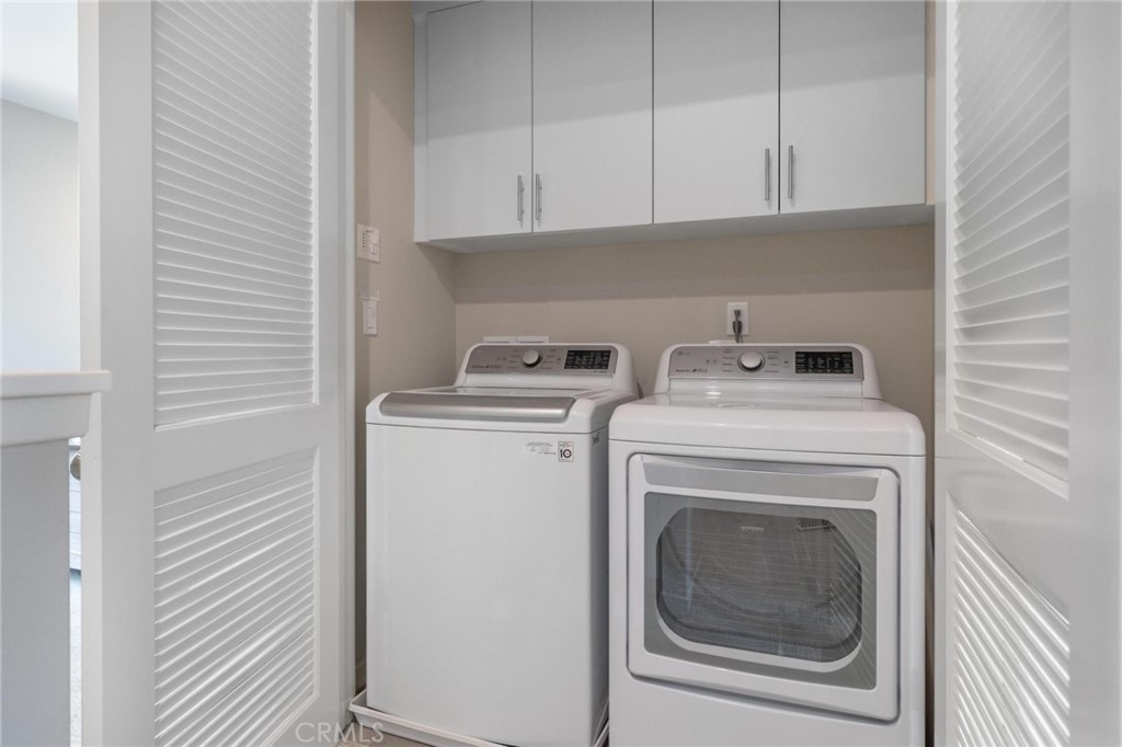 125 Leafy Twig Irvine, CA 92618 - Photo 28 of 35 a utility room with dryer and washer