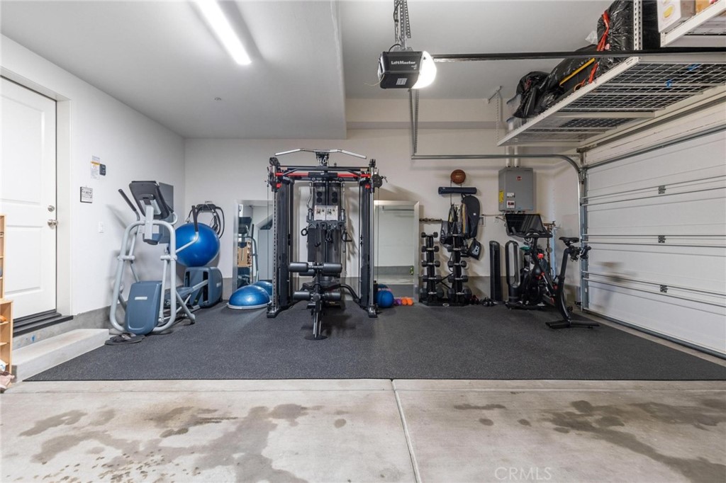 125 Leafy Twig Irvine, CA 92618 - Photo 29 of 35 a view of a garage with a bike and car
