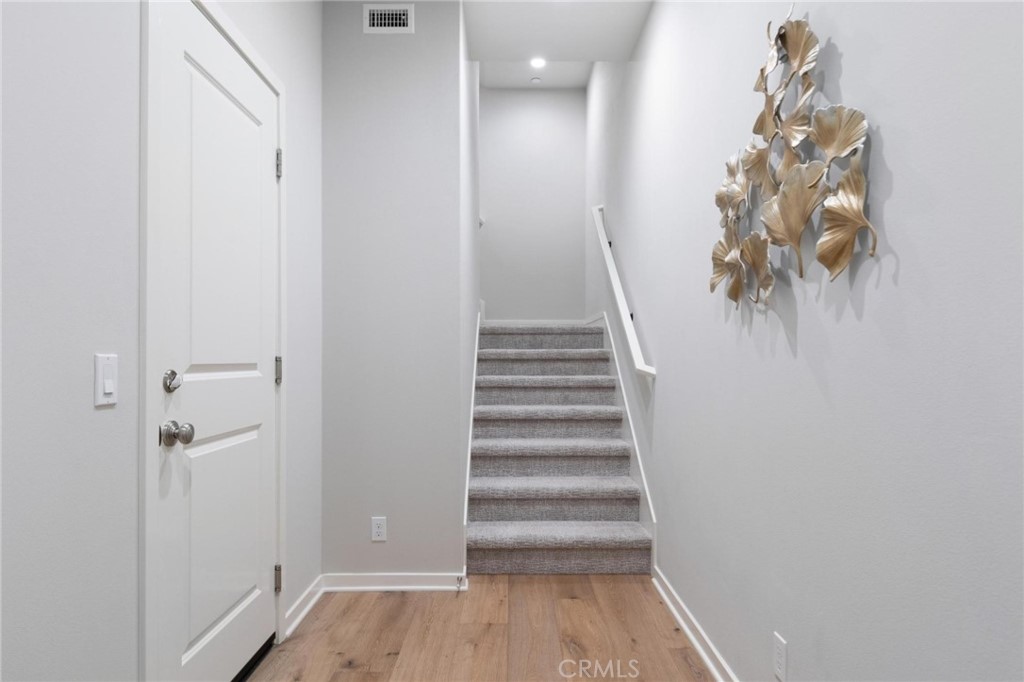 125 Leafy Twig Irvine, CA 92618 - Photo 6 of 35 a view of entryway with wooden floor