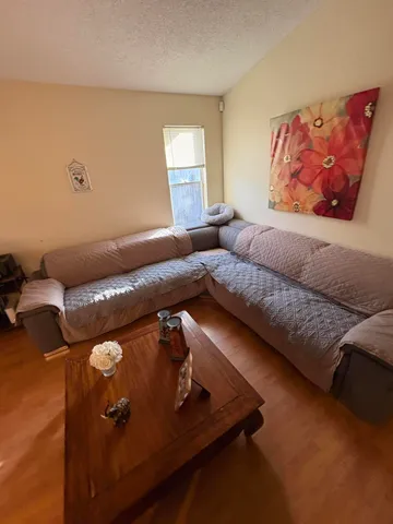 a living room with furniture and a couch