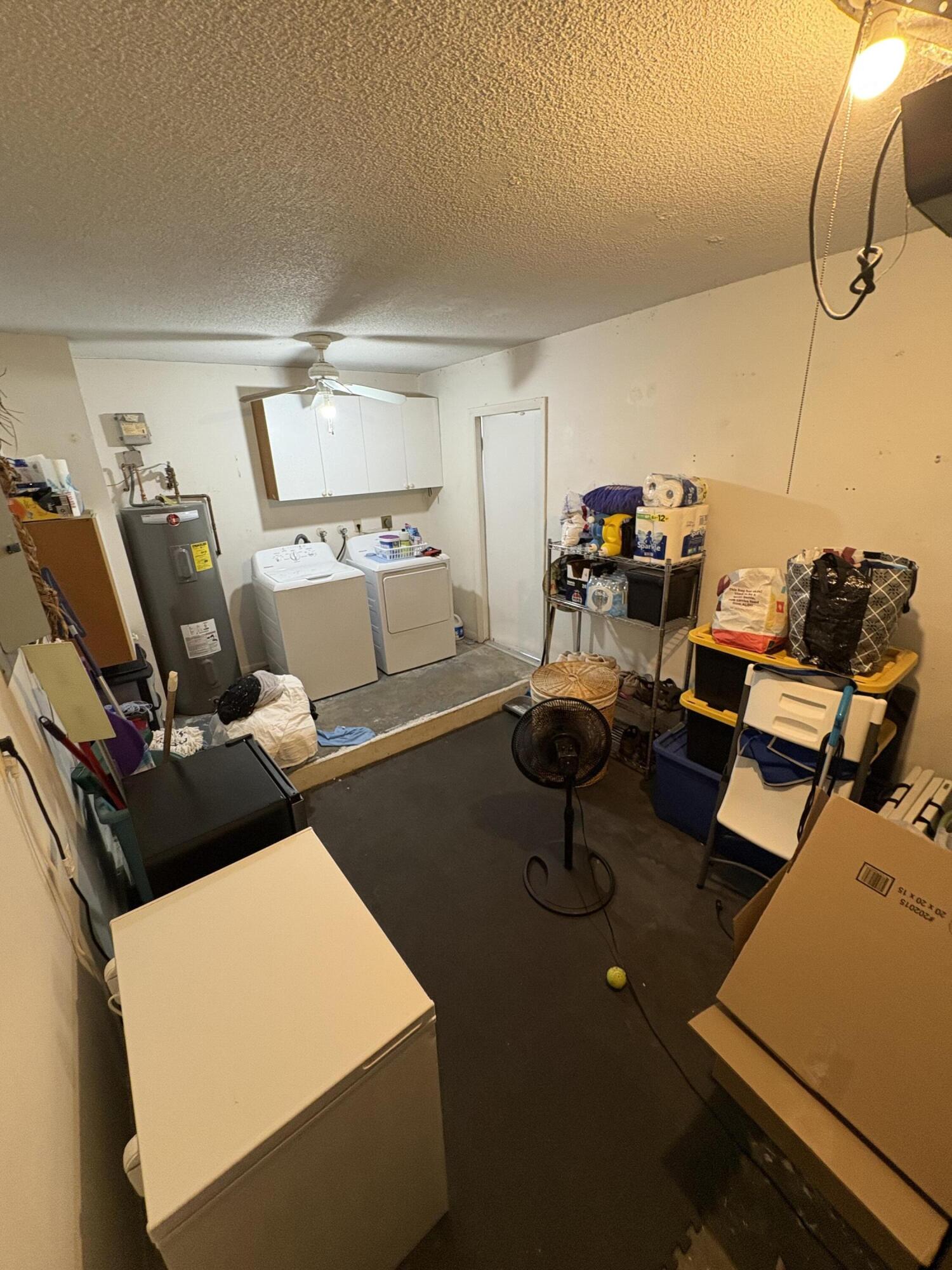 1011 Southwest 134th Avenue Davie, FL 33325 - Photo 16 of 18 a living room with furniture and a flat screen tv