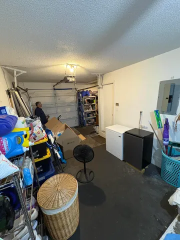 a room with furniture and gym equipment