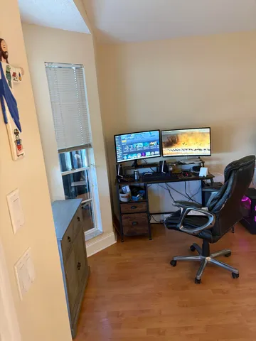 a room with furniture and a flat screen tv