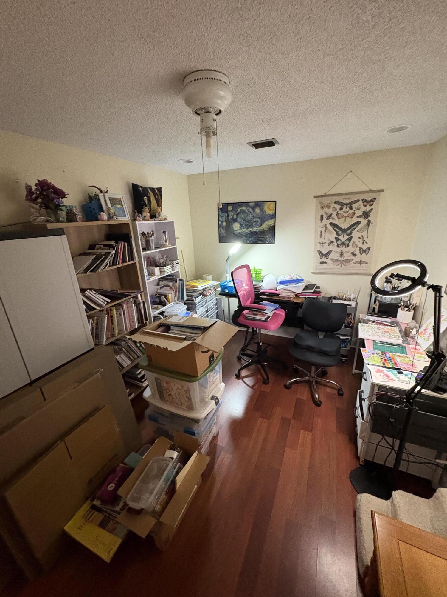 1011 Southwest 134th Avenue Davie, FL 33325 - Photo 6 of 18 a living room with furniture and a wooden floor