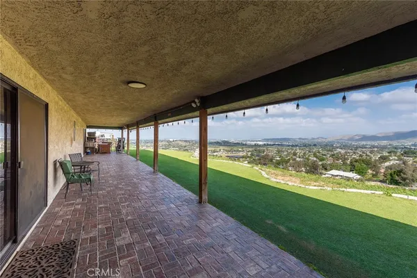 a view of a porch with a yard