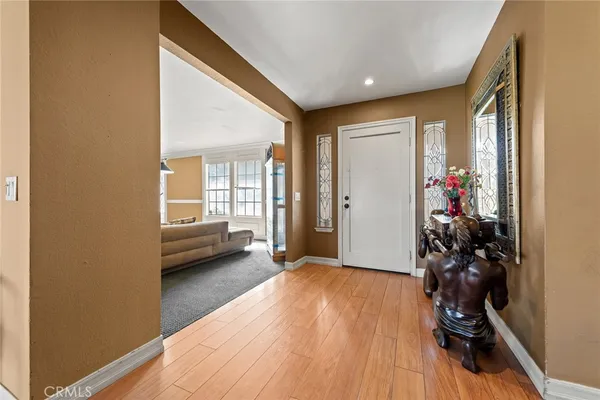 a view of livingroom with furniture and front door