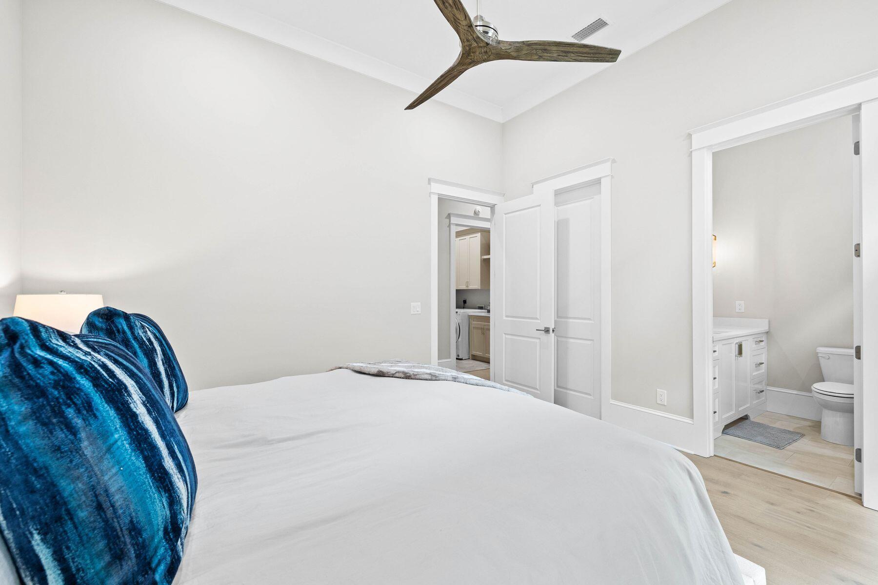 2939 Pine Valley Road Miramar Beach, FL 32550 - Photo 54 of 71 a bedroom with a bed and a view of bathroom