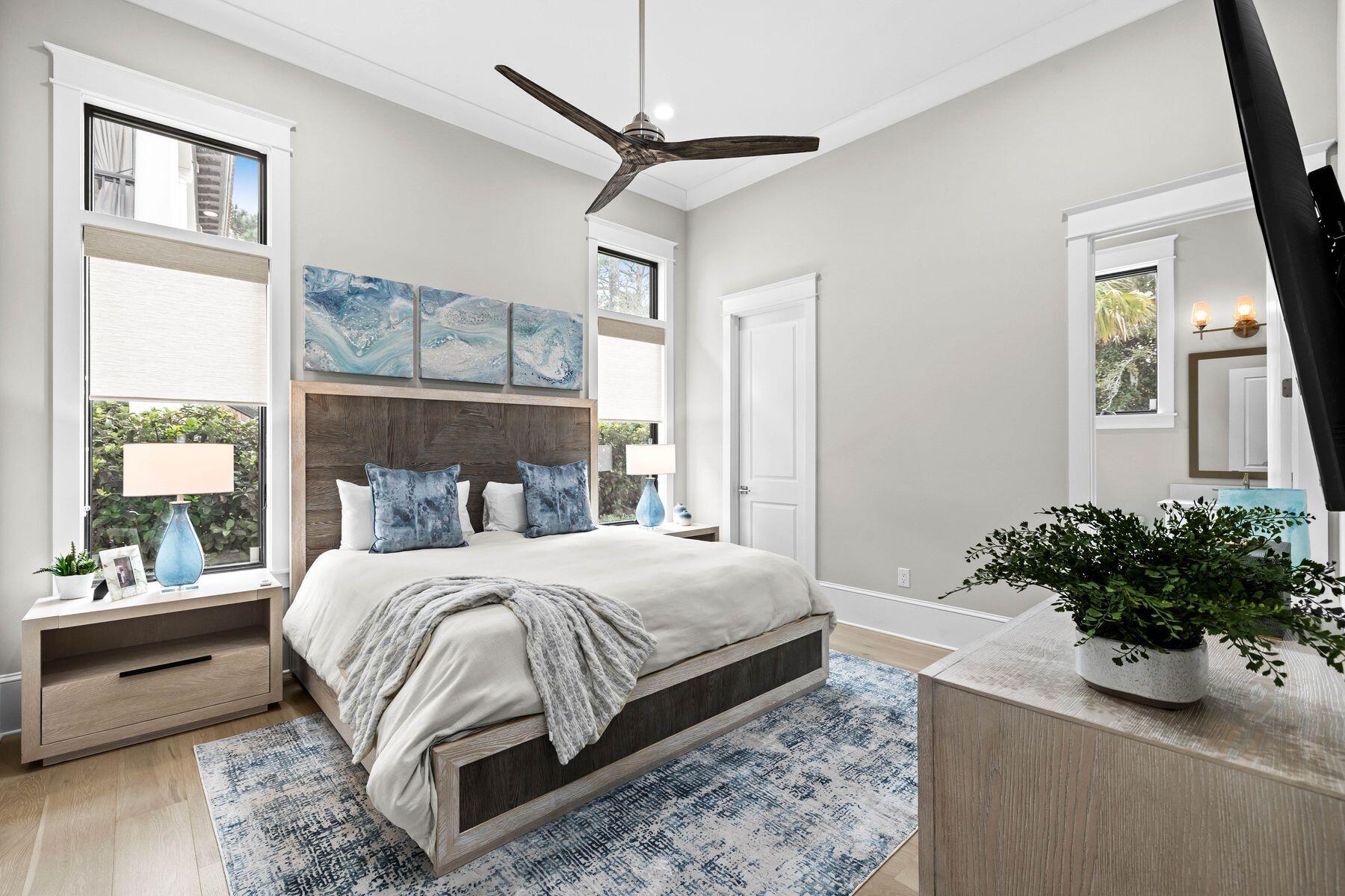 2939 Pine Valley Road Miramar Beach, FL 32550 - Photo 61 of 71 a bedroom with a bed table and a window