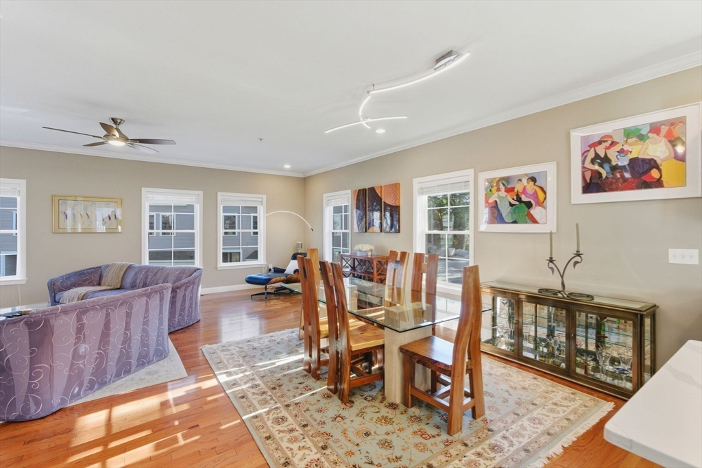 66 Compass Point, Unit 66 North Andover, MA 01845 - Photo 18 of 42 a living room with furniture and wooden floor