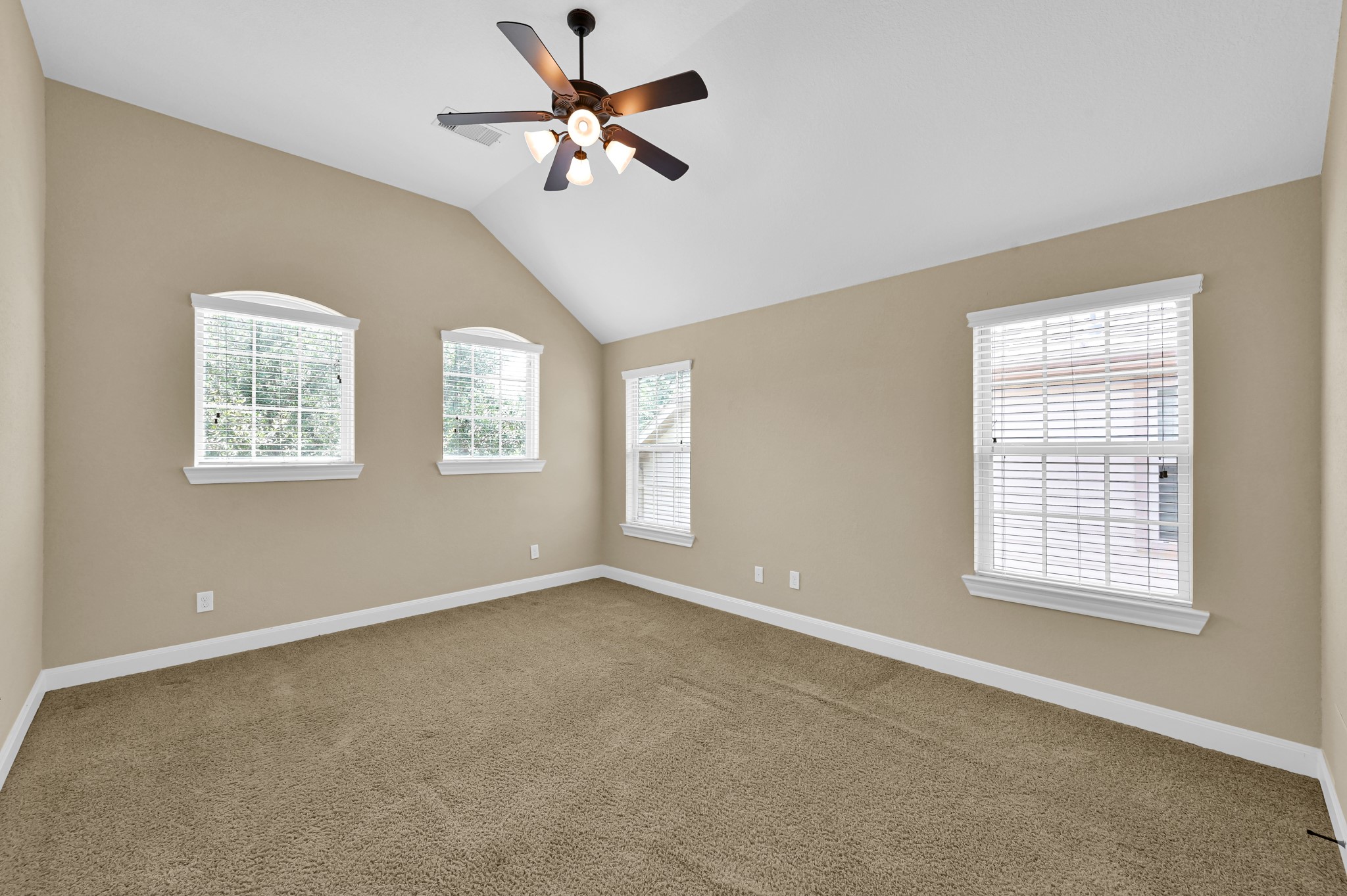 106 North Pinto Point Circle Spring, TX 77389 - Photo 16 of 39 a view of an empty room with a window