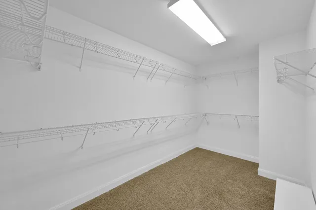 a view of a room with racks on the wall