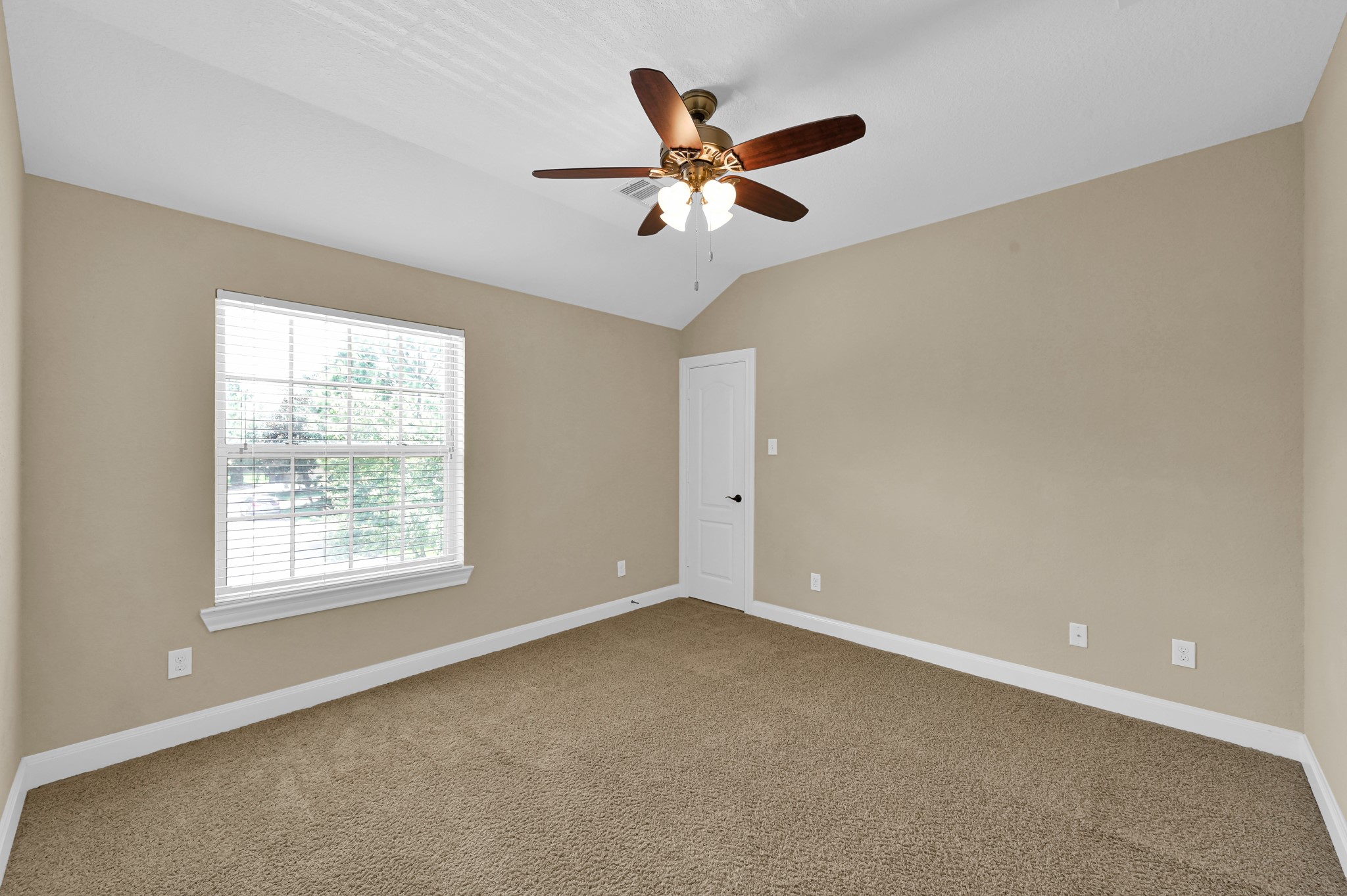 106 North Pinto Point Circle Spring, TX 77389 - Photo 28 of 39 a view of an empty room with a window