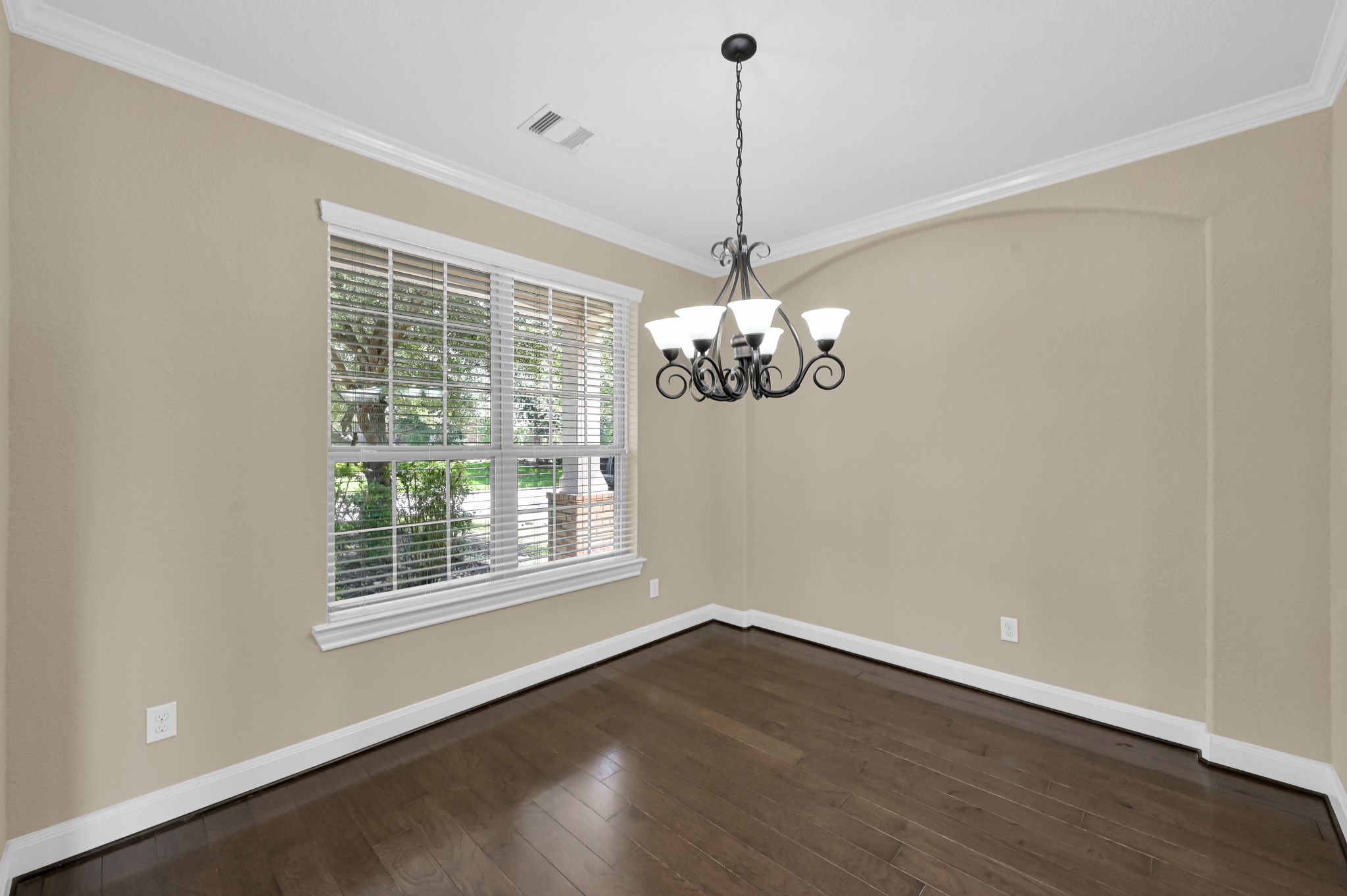 106 North Pinto Point Circle Spring, TX 77389 - Photo 4 of 39 a view of a room with wooden floor chandelier and windows