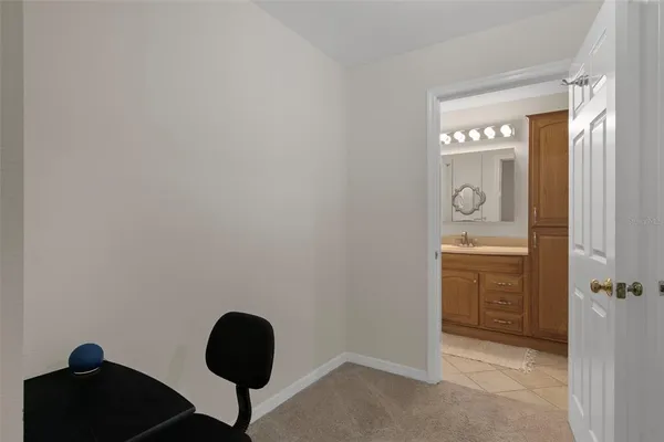 a bathroom with a sink double vanity and a mirror