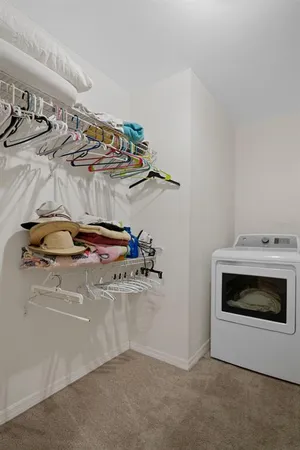 a bathroom with a shower a toilet and a sink