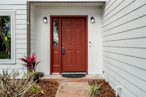 a view of a entryway door front of the house