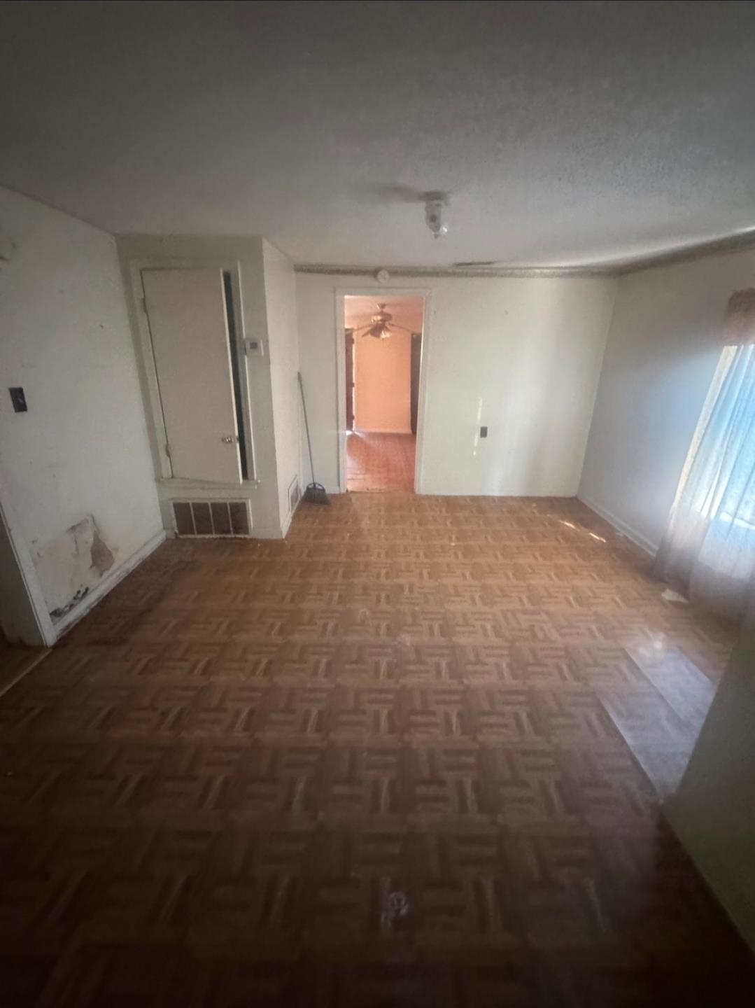 1719 Fields Road Memphis, TN 38109 - Photo 5 of 10 a view of an empty room and window