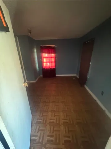 a view of empty room with a window