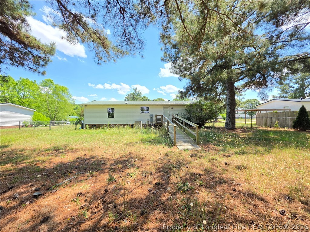 124 Franklin Road Raeford, NC 28376 - Photo 3 of 15 a view of a house with a yard