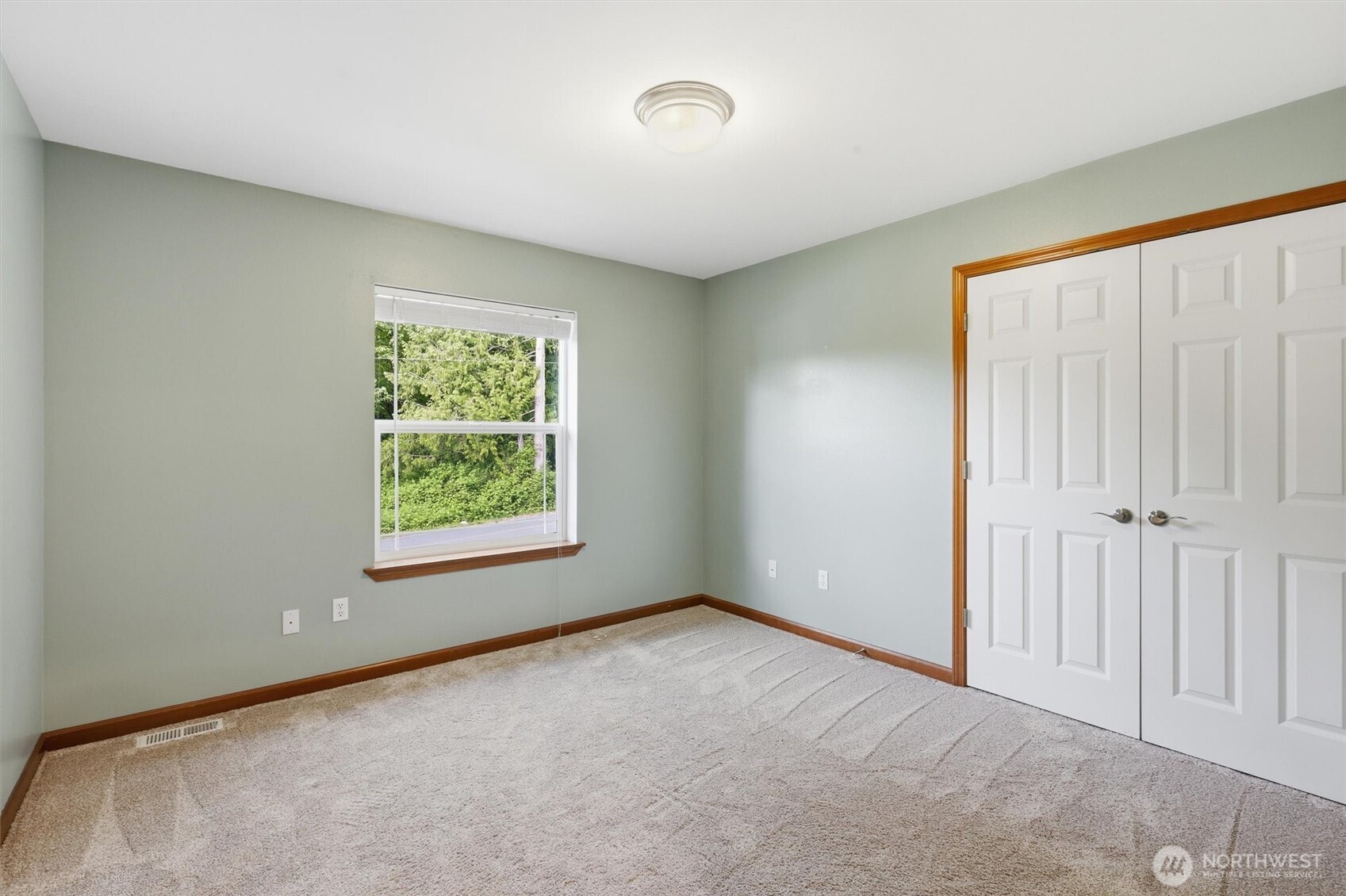 4202 Silvana Terrace Road Stanwood, WA 98292 - Photo 27 of 40 an empty room with windows