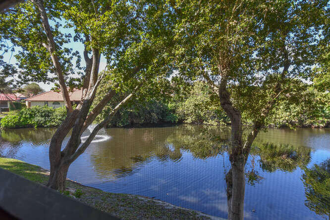 1605 Highway 1, Unit C203 Jupiter, FL 33477 - Photo 14 of 31 a view of a lake with houses in outdoor space