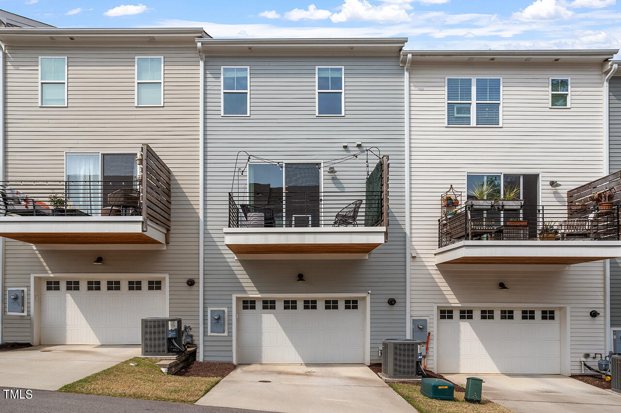 638 Watauga Street Raleigh, NC 27604 - Photo 30 of 41 Oversized 1 car garage. Inside garage area is tankless gas water heater.