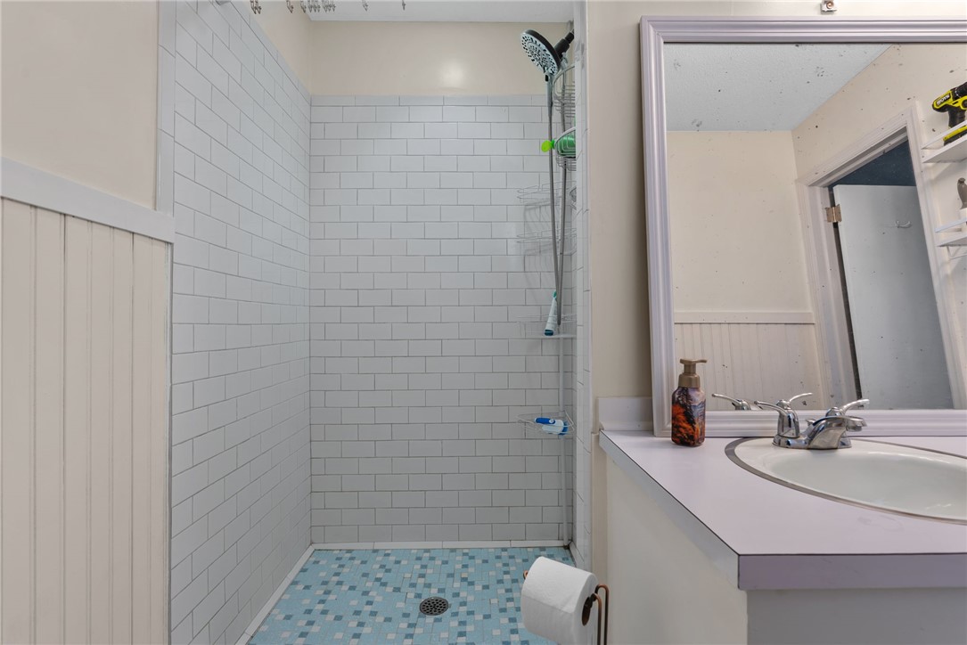 300 Green Street Williamston, SC 29697 - Photo 16 of 47 This updated bathroom offers both style and function with clean lines and modern finishes.