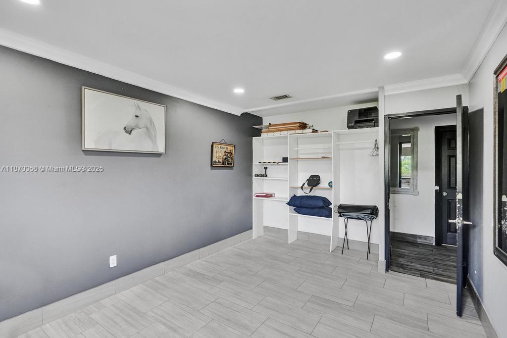 900 Crystal Lake Drive, Unit 2B Deerfield Beach, FL 33073 - Photo 12 of 41 a view of a livingroom with furniture