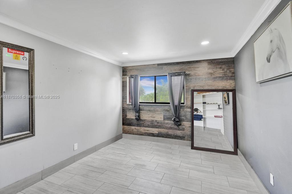 900 Crystal Lake Drive, Unit 2B Deerfield Beach, FL 33073 - Photo 14 of 41 a view of an empty room