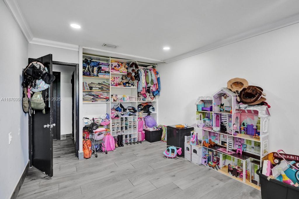 900 Crystal Lake Drive, Unit 2B Deerfield Beach, FL 33073 - Photo 16 of 41 a view of a storage in a room