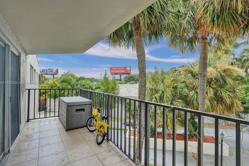 900 Crystal Lake Drive, Unit 2B Deerfield Beach, FL 33073 - Photo 29 of 41 a view of a balcony with outdoor space