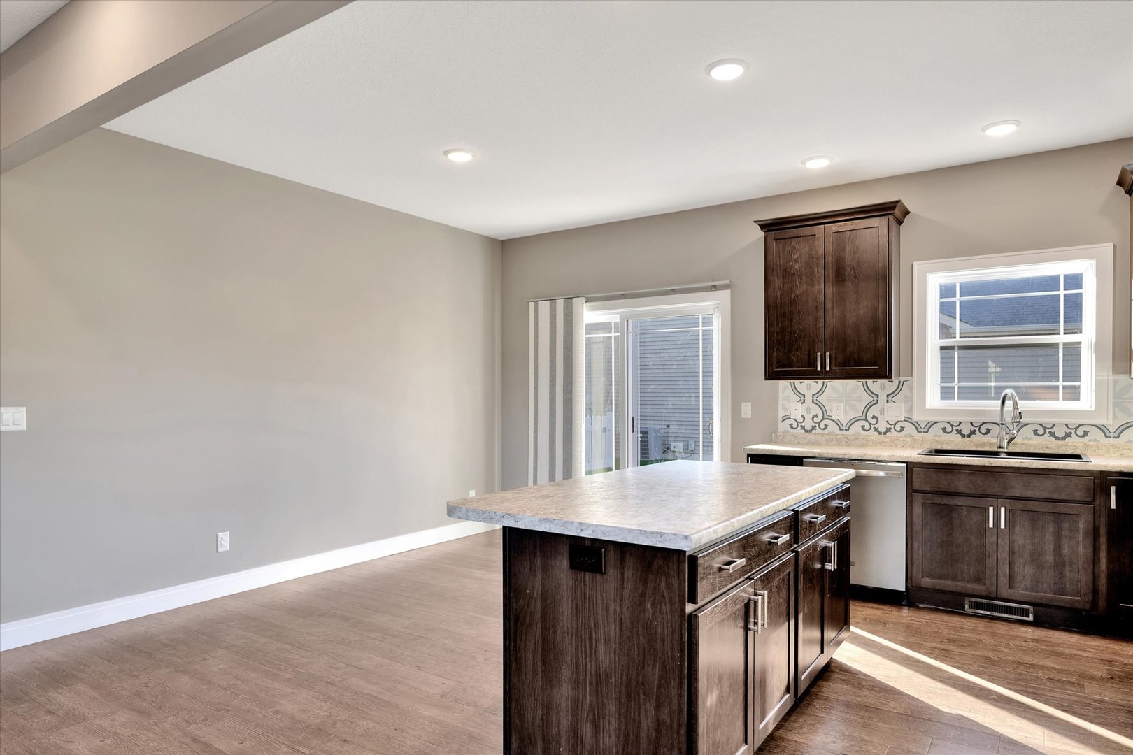 3402 Boulder Ridge Drive Champaign, IL 61822 - Photo 12 of 42 a kitchen with granite countertop a sink and a stove