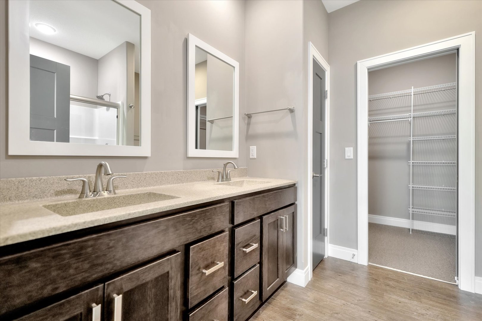 3402 Boulder Ridge Drive Champaign, IL 61822 - Photo 16 of 42 a bathroom with a sink double vanity and a mirror