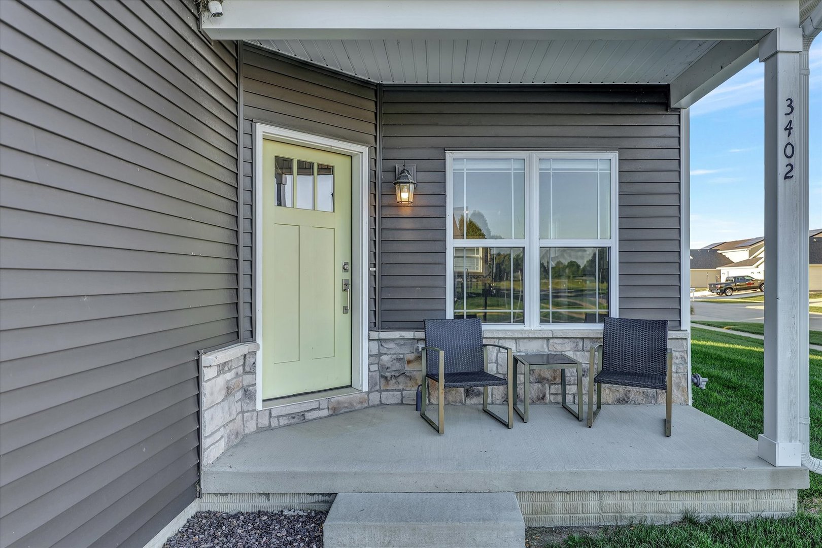 3402 Boulder Ridge Drive Champaign, IL 61822 - Photo 2 of 42 a house view with a outdoor seating space