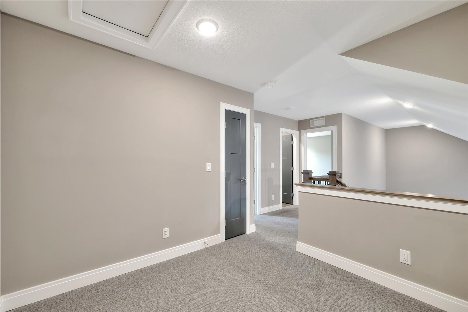 3402 Boulder Ridge Drive Champaign, IL 61822 - Photo 24 of 42 an empty room with kitchen view