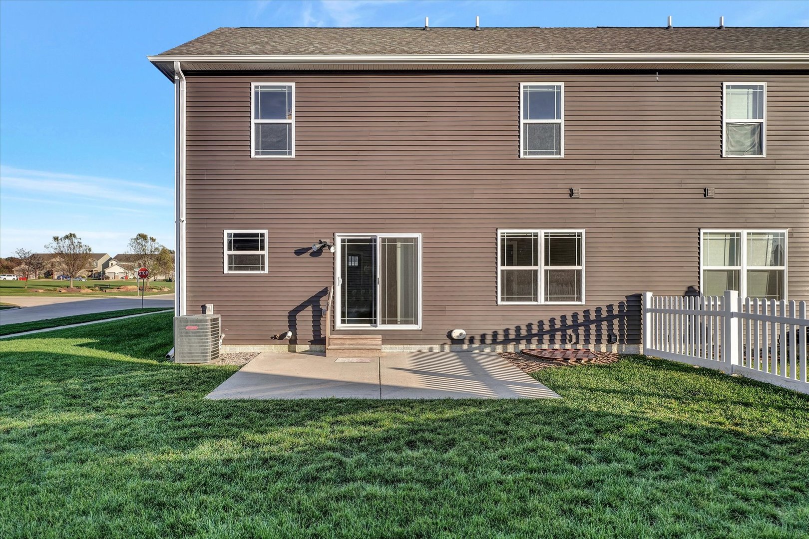 3402 Boulder Ridge Drive Champaign, IL 61822 - Photo 37 of 42 a front view of a house with garden