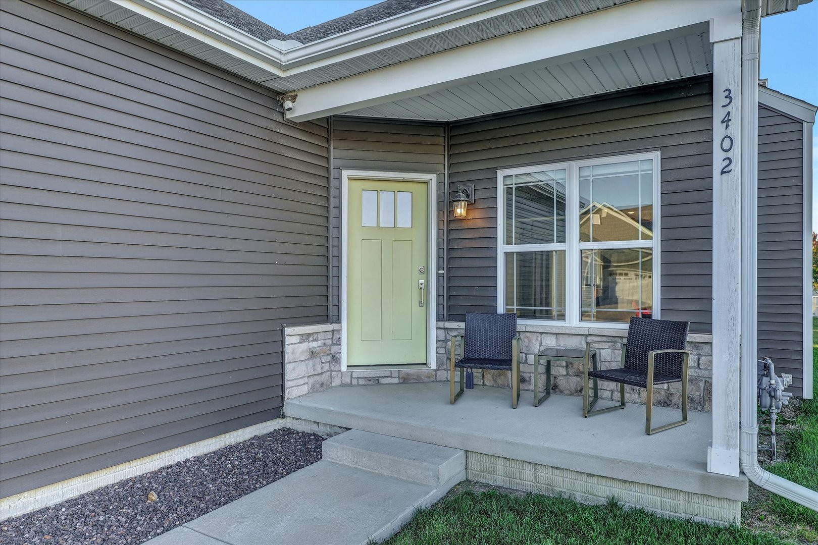 3402 Boulder Ridge Drive Champaign, IL 61822 - Photo 39 of 42 a house view with a outdoor seating