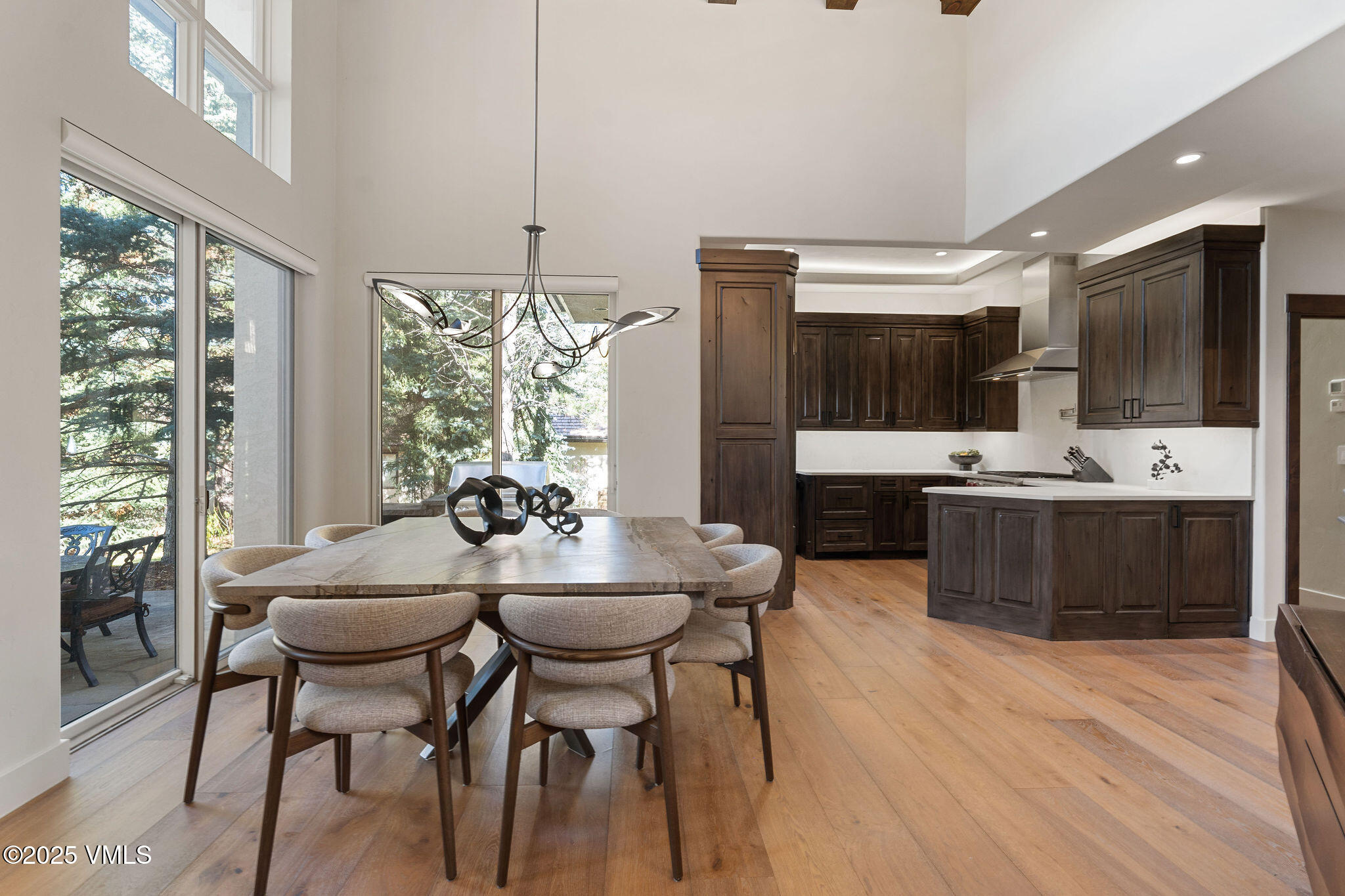 150 Sawatch Drive Edwards, CO 81632 - Photo 11 of 34 a view of a dining room with furniture window and wooden floor