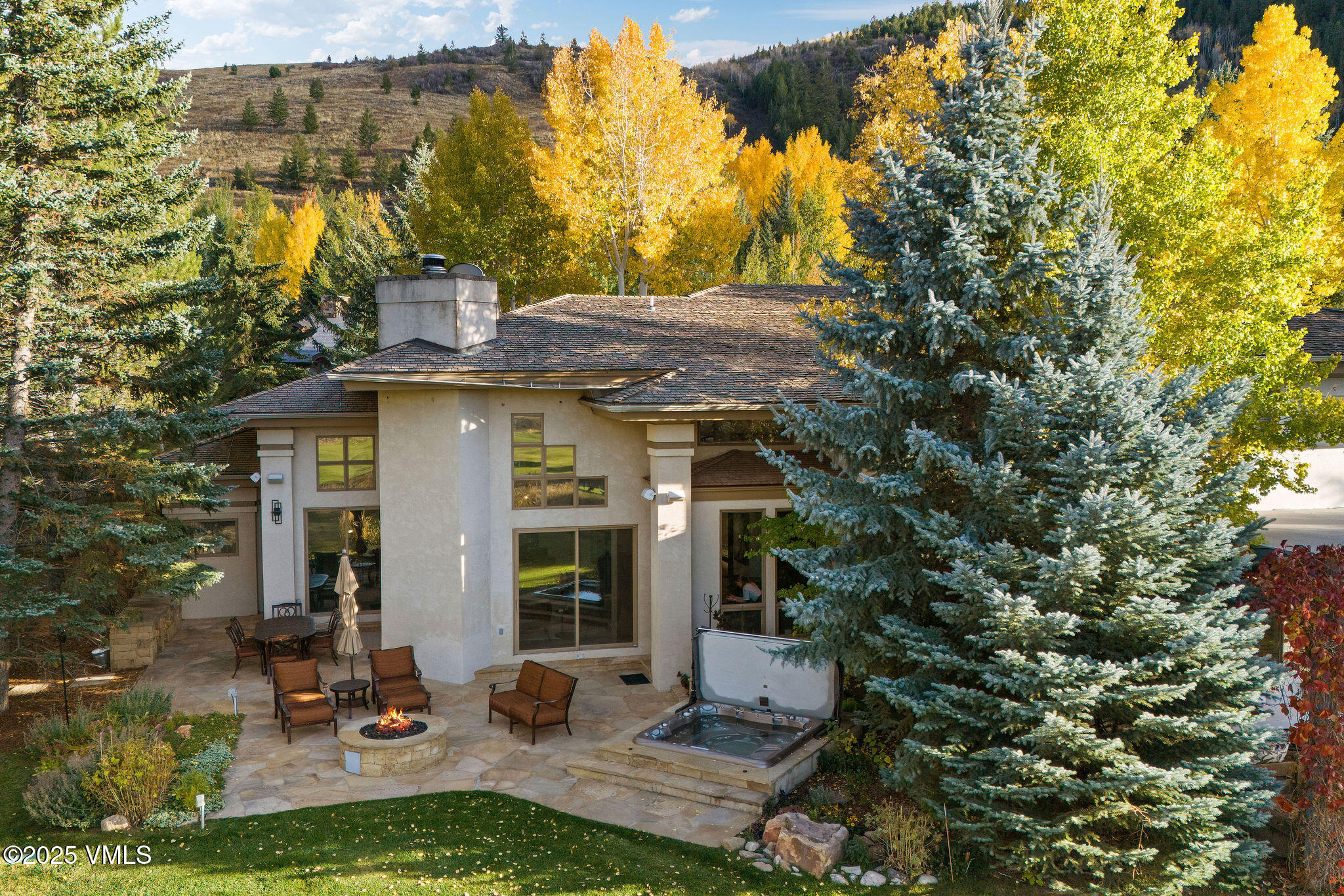 150 Sawatch Drive Edwards, CO 81632 - Photo 32 of 34 a view of a house with backyard and sitting area