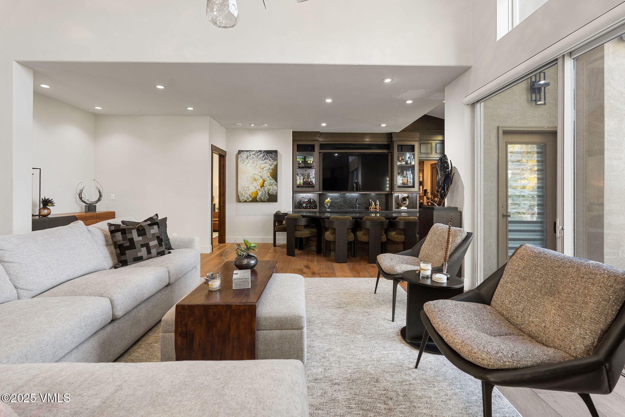 150 Sawatch Drive Edwards, CO 81632 - Photo 6 of 34 a living room with furniture and a flat screen tv
