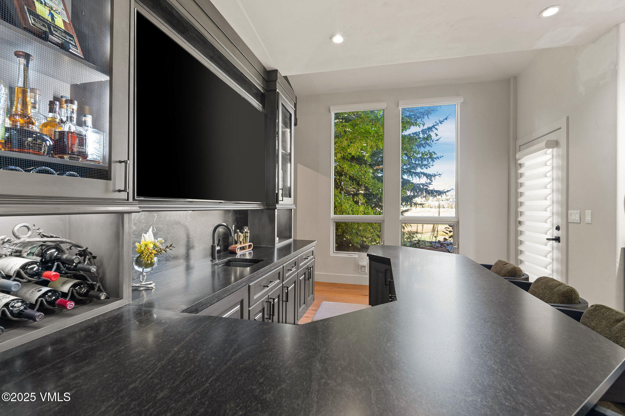 150 Sawatch Drive Edwards, CO 81632 - Photo 8 of 34 a living room with furniture and a flat screen tv