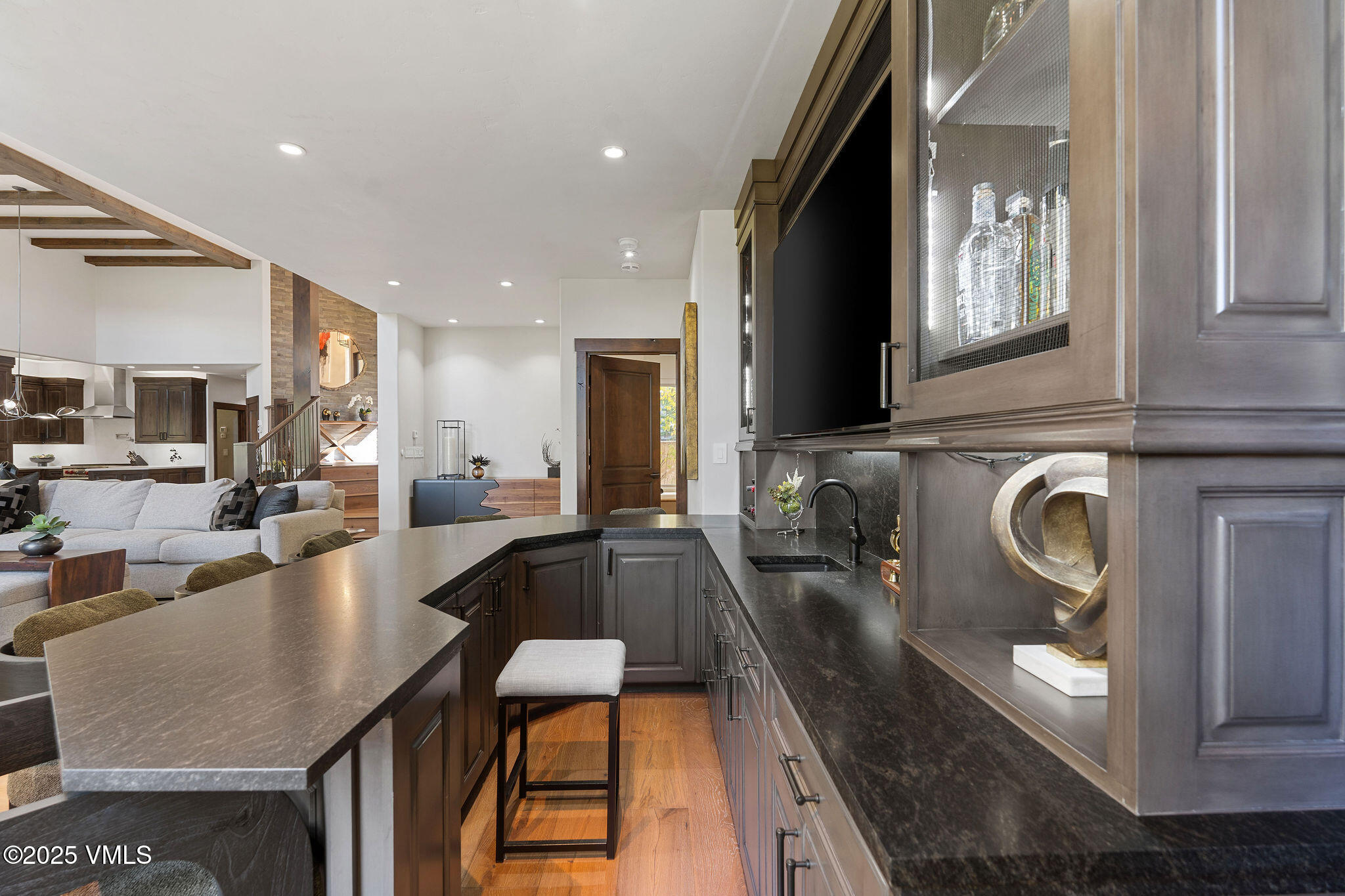 150 Sawatch Drive Edwards, CO 81632 - Photo 10 of 34 a large kitchen with stainless steel appliances granite countertop a lot of cabinets a stove and a refrigerator