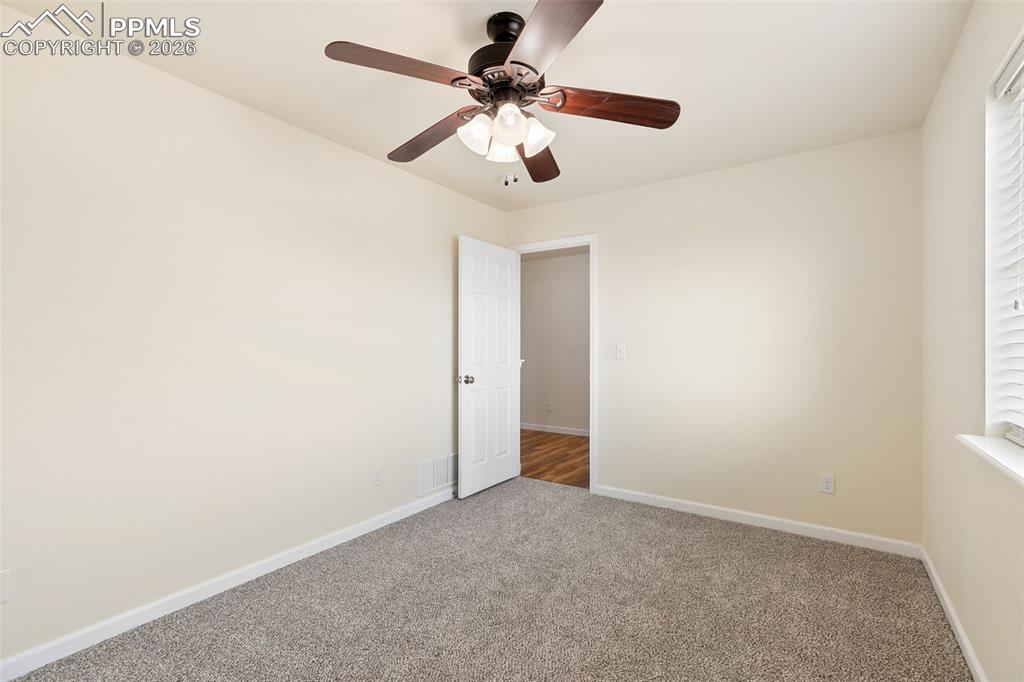 7678 Dutch Loop Colorado Springs, CO 80925 - Photo 21 of 29 a view of an empty room
