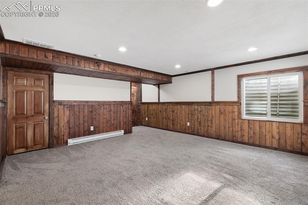 7678 Dutch Loop Colorado Springs, CO 80925 - Photo 24 of 29 a view of an empty room with a window