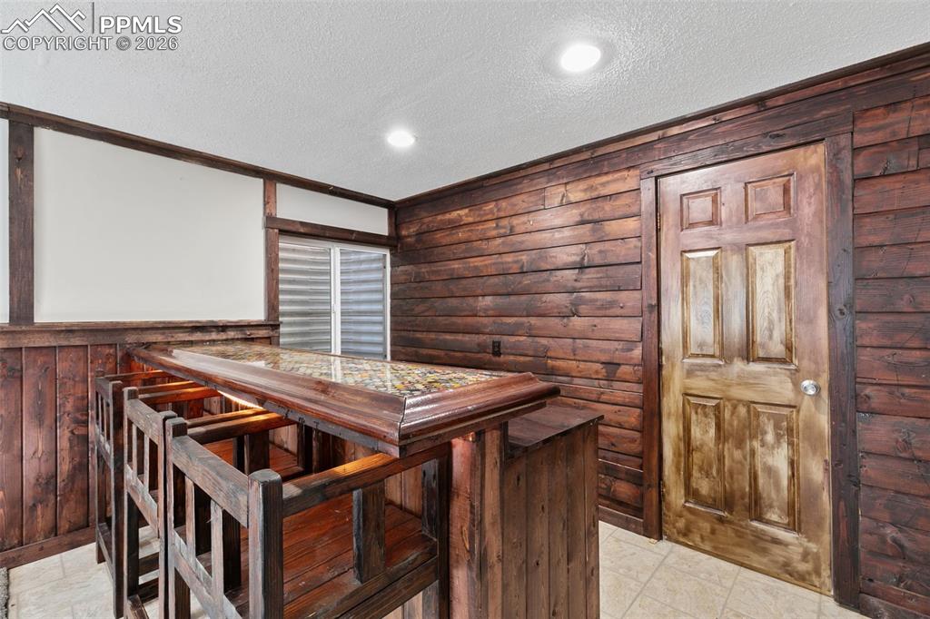 7678 Dutch Loop Colorado Springs, CO 80925 - Photo 25 of 29 a view of an oven with chairs