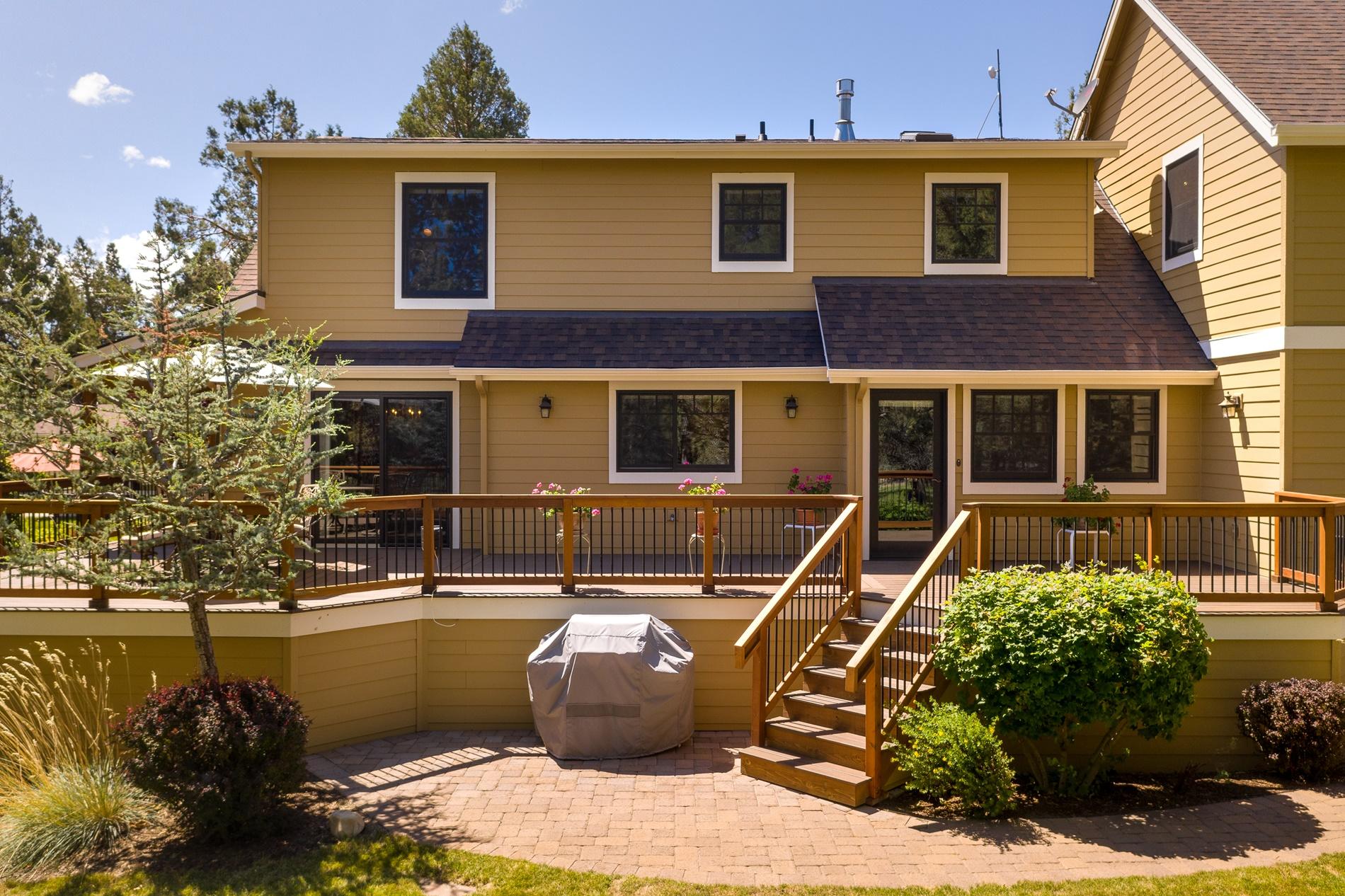 64980 Gerking Market Road Bend, OR 97703 - Photo 2 of 35 This is the back deck looking out east. It has a view of another pond with a water feature.