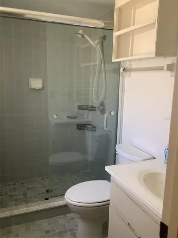 a bathroom with a sink and toilet